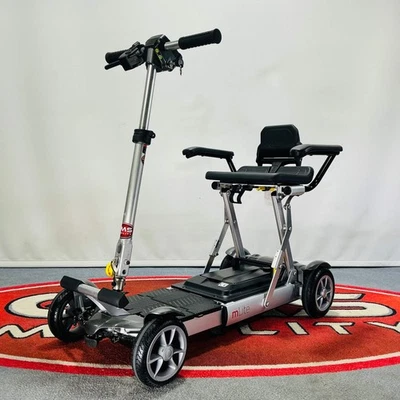 EX DEMO MOTION MLITE MK2 (CARECO MINIMUS) FOLDING BOOT MOBILITY SCOOTER BUGGY - Image 1 of 4
