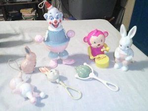 COLLECTION OF 7VINTAGE HARD PLASYIC TOYSS RATTLES CLOWN EASTER BUNNY MORE - Picture 1 of 9