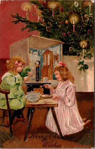 LOVING CHRISTMAS GREETINGS - SISTERS PLAY BY TREE - PFB 6493 - EMBOSSED POSTCARD - Picture 1 of 2