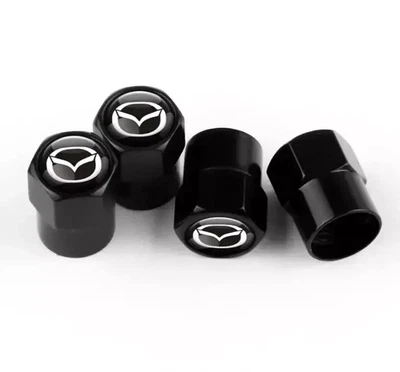MAZDA 4x Black Tyre Valve Dust Caps BRAND NEW - Image 1 of 2