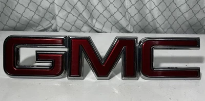 GMC Acadia Sierra Yukon OEM parrilla delantera emblema insignia cromo rojo #23456058 Foto 1 de 4