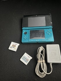 Nintendo 3DS Handheld System Aqua Blue w/ charger and 2 games
