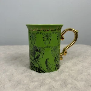 Taza de café Anthropologie verde negra floral taza de té mango dorado flor - Imagen 1 de 8