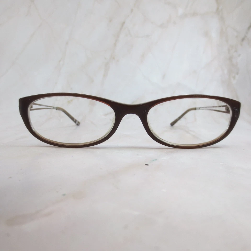 Marco de gafas Geoffrey Beene Brilliance para mujer de plástico marrón borde completo ovalado Foto 1 de 4