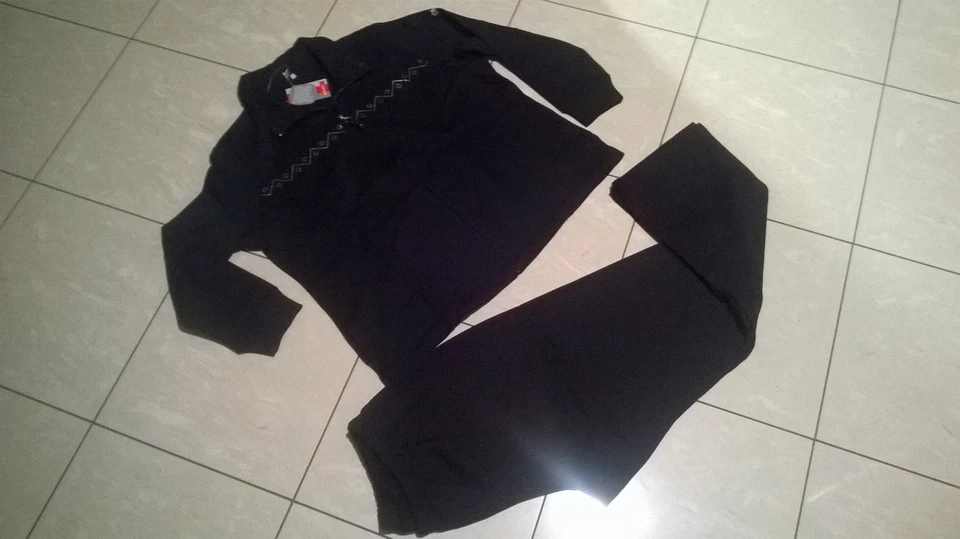 Tuta donna felpata colore nero  taglie forti - Immagine 1 di 1