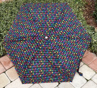 TOTES SIGNATURE UMBRELLA BLACK RAINDROPS SUNGUARD 50 SPF 44 IN COVERAGE NWT - Image 1 of 2