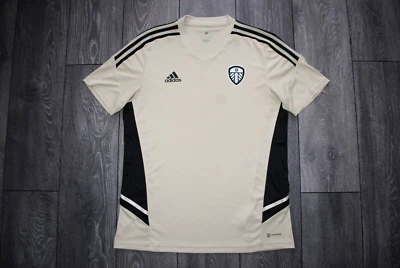 CAMISETA DE FUTBOL LEEDS UNITED 2022 2023 ENTRENAMIENTO ADIDAS COLOR DORADO HOMBRE L Foto 1 de 4