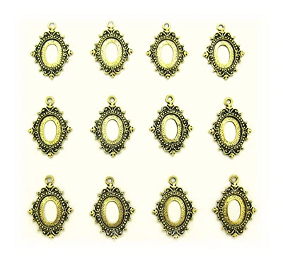 12 Antiqued Goldtone ENCHANTED 18mm x 13mm CAMEO PENDANT or Earrings Settings - Image 1 of 4