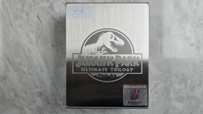 JURASSIC PARK TRILOGY ONE CLICK STEELBOOK BOXSET HDZETA NEW AND SEALED - Image 1 of 4