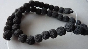 Lava Perlen synth., rund matt schwarz, 10mm Strang, ca. 34 Stück 2726 - Bild 1 von 3