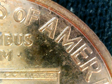 2002s Lincoln cent with wide AM (on reverse) Cover