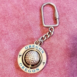 Oregon Logo Golfball gold silberfarben Doppel Spinner Schlüsselanhänger Schlüsselanhängsel M1 - Bild 1 von 7