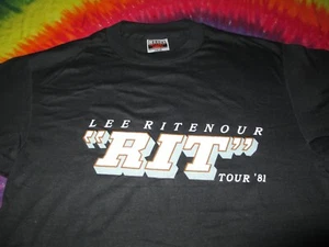 CAMISETA NEGRA LEE ""RIT"" TENSOUR JAZZ SOUL ROCK GUITARRISTA 1981 TOUR - GRANDE - NUEVA - Imagen 1 de 3