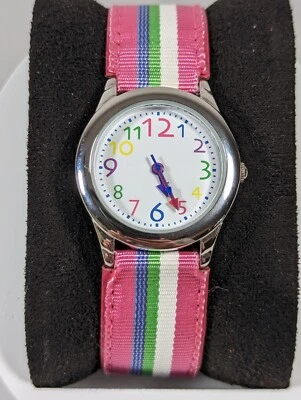 Reloj con correa de lona esfera blanca redonda tono plata caja rosa blanco verde azul Foto 1 de 4