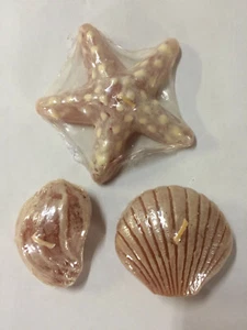 Set tre candele cera a forma di conchiglia/conchiglia/pesce stella nuove in confezione sigillata - Foto 1 di 2