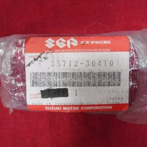 35712-30410  OEM NEW GENUINE SUZUKI TAILIGHT LENS PE175 250 400 DR100 125 250 - Picture 1 of 3