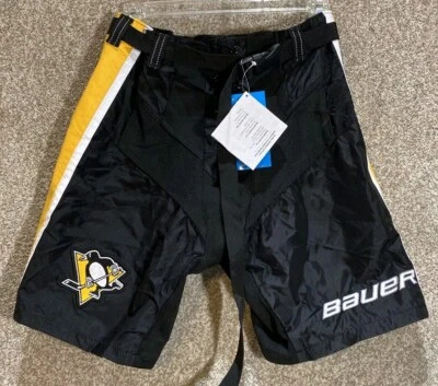 Pantalones de hockey Bauer Pittsburgh Penguins jóvenes talla Jr grande nuevos con etiquetas nuevos Foto 1 de 4