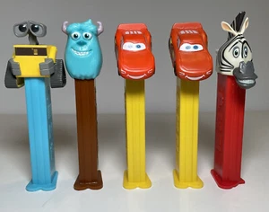 Pez Dispensers Lightning McQueen Marty WALL-E Sulley Cars Monsters Inc - Foto 1 di 4
