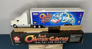 Neu Texaco Izzy's 1996 Olympische Spiele Spielzeug Autoträger Sammler Serie #4 - Bild 1 von 7