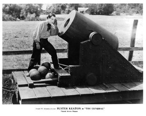 Buster Keaton putting his ear to cannon in 'The General' 1926 OLD PHOTO