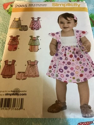 Simplicity Pattern 2985 ~ Babies' Dress, Top, Cropped Pants/Panties ~ XXS-L - Image 1 of 4