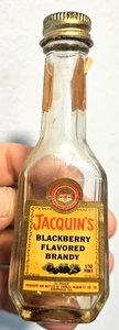 Botella de vidrio vacía Jacquins con sabor a mora brandy 1/10 pinta - Imagen 1 de 4