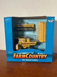 Ertl Farm Machines 1/64 New Holland TR-97 Combine w/Corn & Grain Heads #815 NIB - Picture 1 of 6
