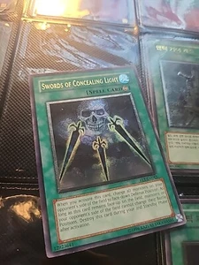 Yu-Gi-Oh! Ultimate Rare Swords of Concealing Light FET-EN042 - Picture 1 of 5
