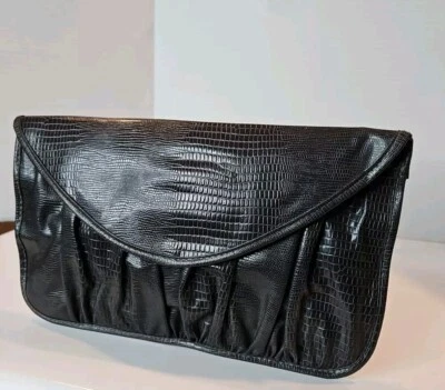 Cartera sin asas vintage para mujer de segunda mano gris oscuro sobre imitación piel Foto 1 de 4