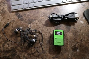 SanDisk Sansa Green Clip Jam 8GB MP3 Player with FM Radio - Picture 1 of 1