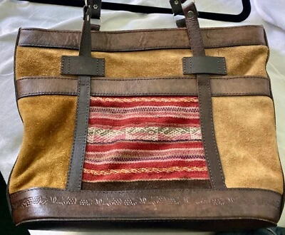 Bolso/Cartera 100% Cuero. Tela tipo bolso tono marrón y rojo súper limpia Foto 1 de 4