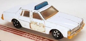 Coche de policía Ertl Dukes of Hazzard Pontiac Bonneville 1/64 luz azul (Hong Kong) - Imagen 1 de 2