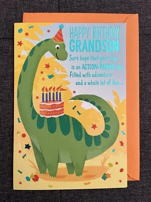 Tarjeta de felicitación Hallmark feliz cumpleaños nieto dinosaurio con pastel y confeti  Foto 1 de 4
