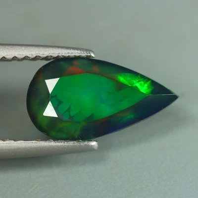 0.93 克拉捕捉眼色图案_100% 天然 Welo 黑色蛋白石宝石 — 第 1/3 张图片