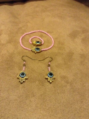 Juego de Bronce Hamsa Mano Cristal Rosa y Mal de Ojo: Pulsera y Anillo y Pendiente Foto 1 de 4