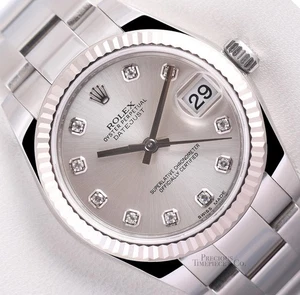 Rolex Datejust 31 mm acciaio Oyster 18K WG lunetta scanalata fabbrica quadrante argento diamante - Foto 1 di 5