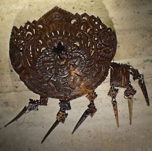 Antique religious Indonesian Garuda set made of a portion of coconut and coconut