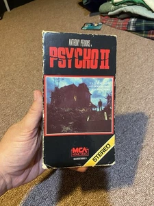Vintage Psycho 2 VHS gelb Stereo Streifen Cover Anthony Perkins MCA, 1984 - Bild 1 von 6