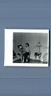 Found B&W Photo A_5976 Pretty Woman Sitting In Chair Holding Object