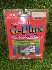 NEW 0N CARD TOMY AFX SUPER G+ RACEMASTER HURRICANE F-1 HO SCALE SLOT CAR - Picture 1 of 6
