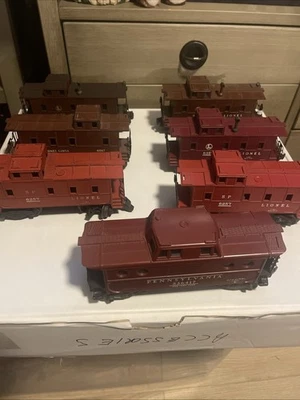 7 Postwar Lionel O Gauge Cabooses 6417,(2) 6057,6017,6257,(2)6457 - Image 1 of 4