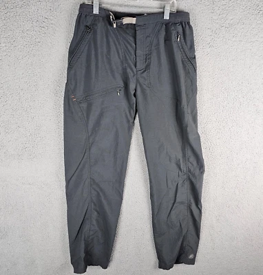 Pantalones cortavientos Nike ACG para mujer talla mediana con cinturón Foto 1 de 4