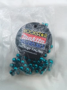 COLLANA ROCKSTAR MAKITA SUZUKI MOTO FACTORY RACING GIVEAWAY MARDI GRAS - Foto 1 di 9