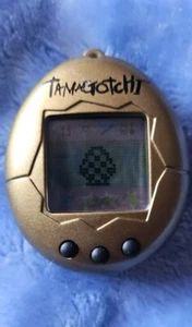 Tamagotchi Gold 1997 Bandai Digital Virtual Pet ***READ DESCRIPTION - Picture 1 of 7