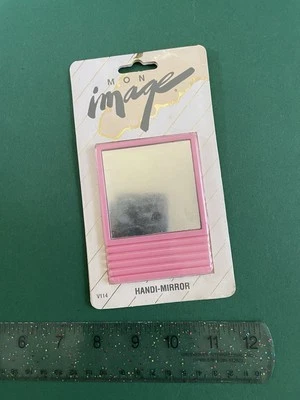 Espejo Handi-Mirror Vintage Años 80 Rosa Imagen Por París Presenta Tocador Utilería Foto 1 de 2