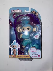 Fingerlings interaktiver Baby Glitzer Affe Amelia von WowWee Touch Bewegungssound - Bild 1 von 2