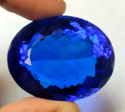 Large Blue Tanzanite 22.55 Ct. Oval Cut Faceted Loose Gemstone Gift for Women - Image 1 of 4