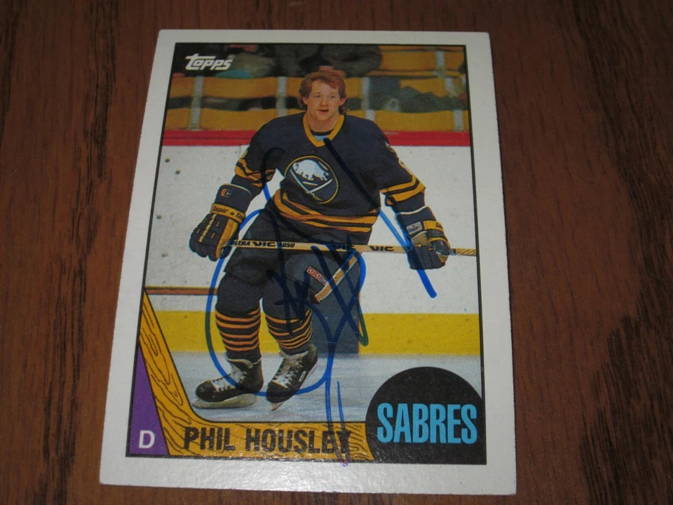 PHIL HOUSLEY SIGNED AUTOGRAPHED 1987 TOPPS CARD # 33 SABRES HOF - Image 1 of 1