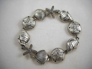 Pulsera Magnética Tono Plata Tema Ocean 7+" ¡Genial! - Imagen 1 de 10