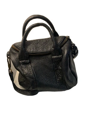 Bolso de Lona Alexander Wang Rockie - Cuero Negro con Herrajes de Latón Foto 1 de 4